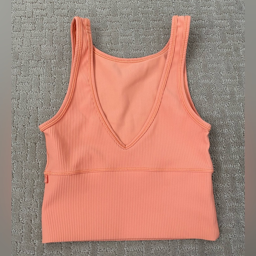 Lululemon EUC size 0 reversible top color is a light coral no size tag